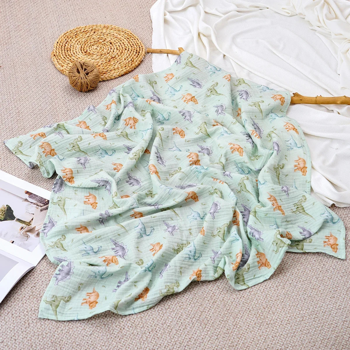Lange bébé en mousseline de coton motif dinosaures menthe