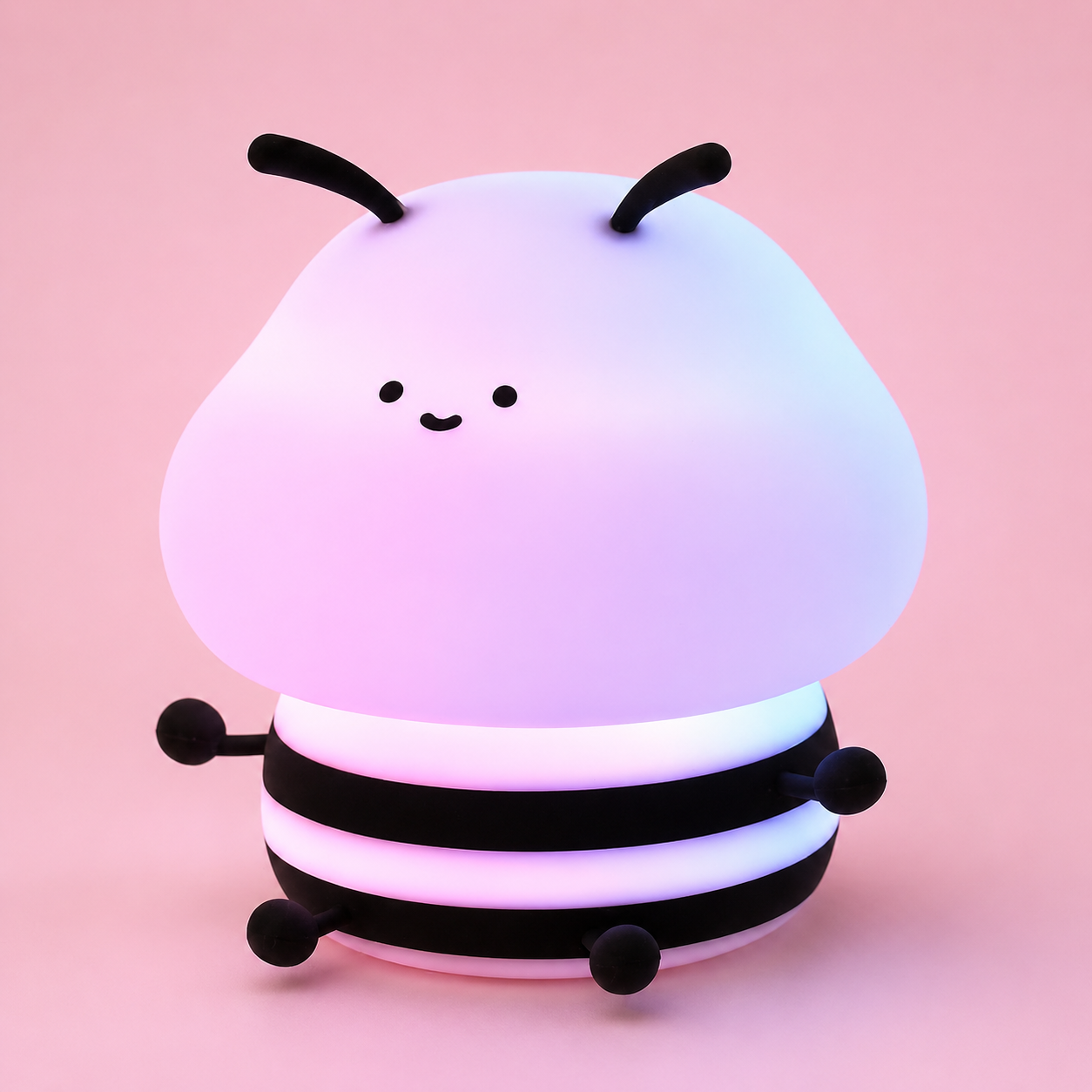 Veilleuse bébé abeille diffusant une lumière multicolore