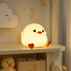 Veilleuse bébé canard en silicone dans une décoration de chambre de bébé