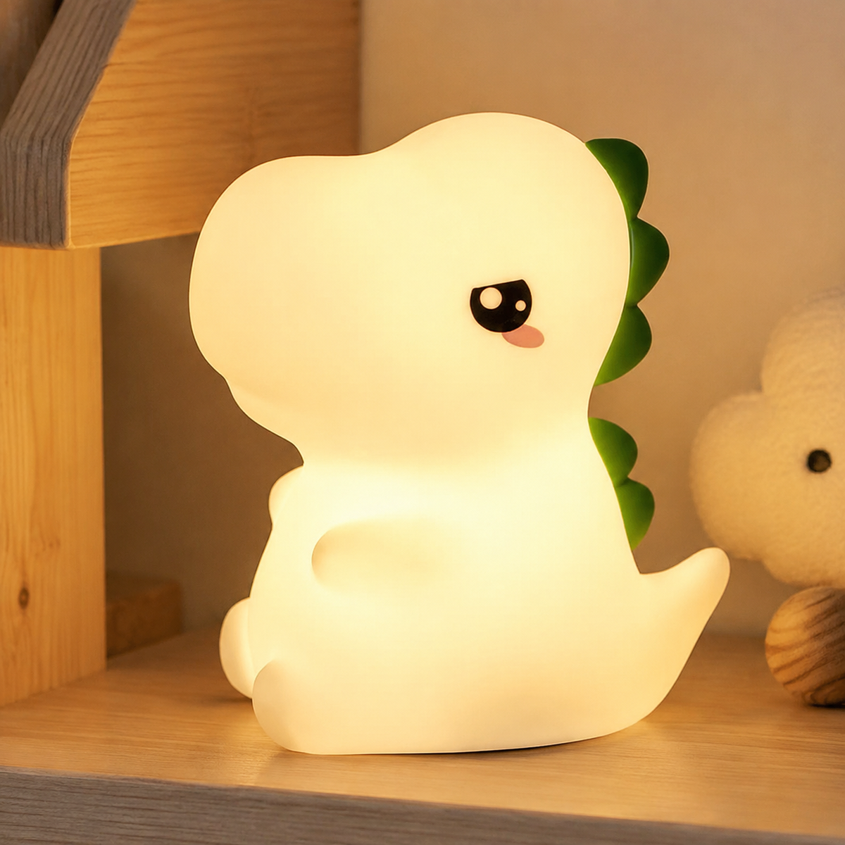 Veilleuse dinosaure diffusant une lumière blanc chaud